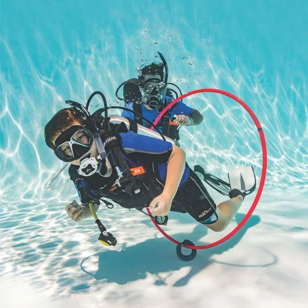 Instructor conducting a fun dive session for kids